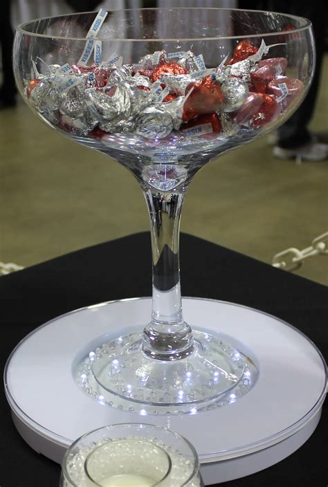 large champagne glasses for centerpieces.